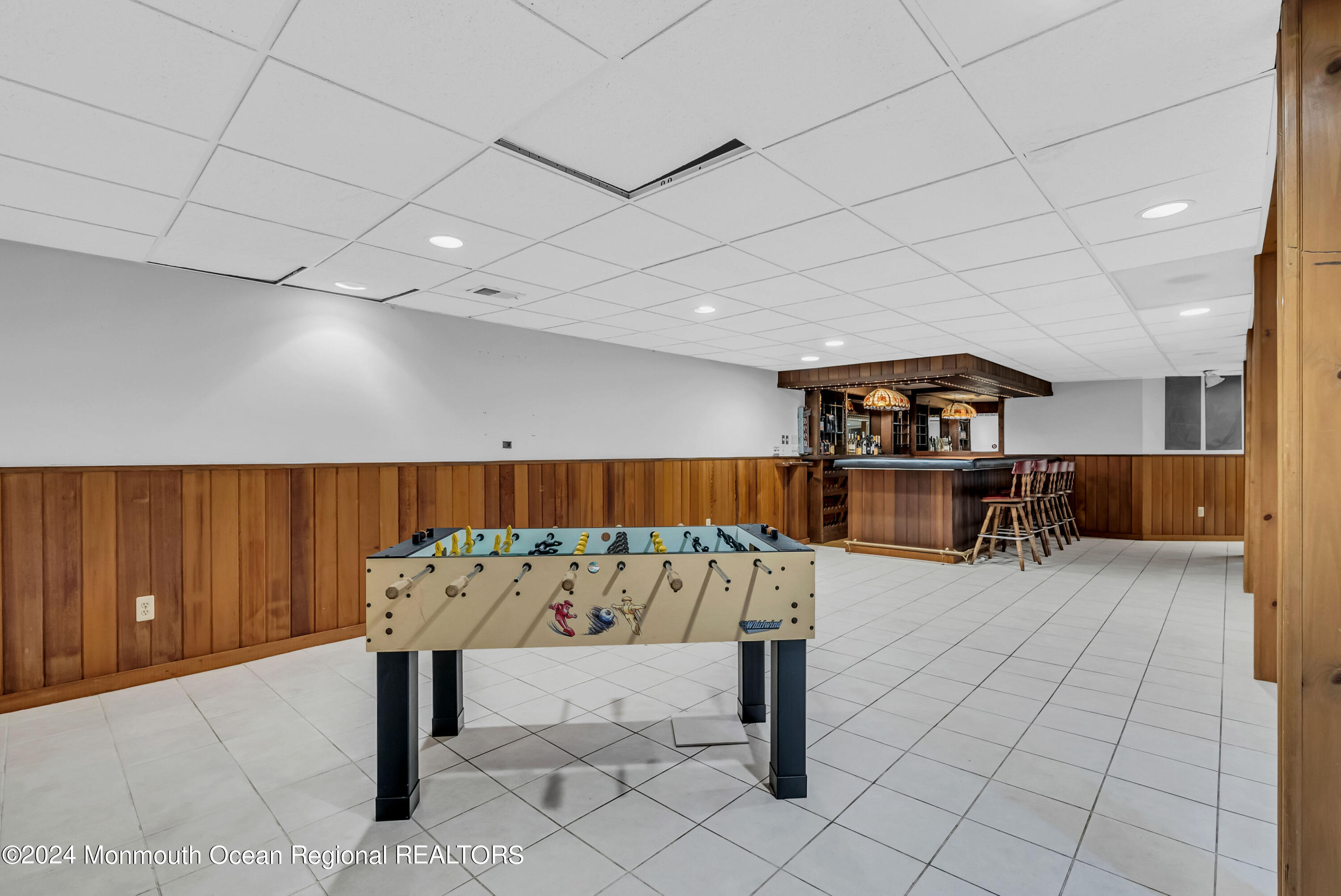 7 Decamp Court West Long Branch, NJ 07764 - Photo 28 of 32 a view of a room with lots of furniture and a table