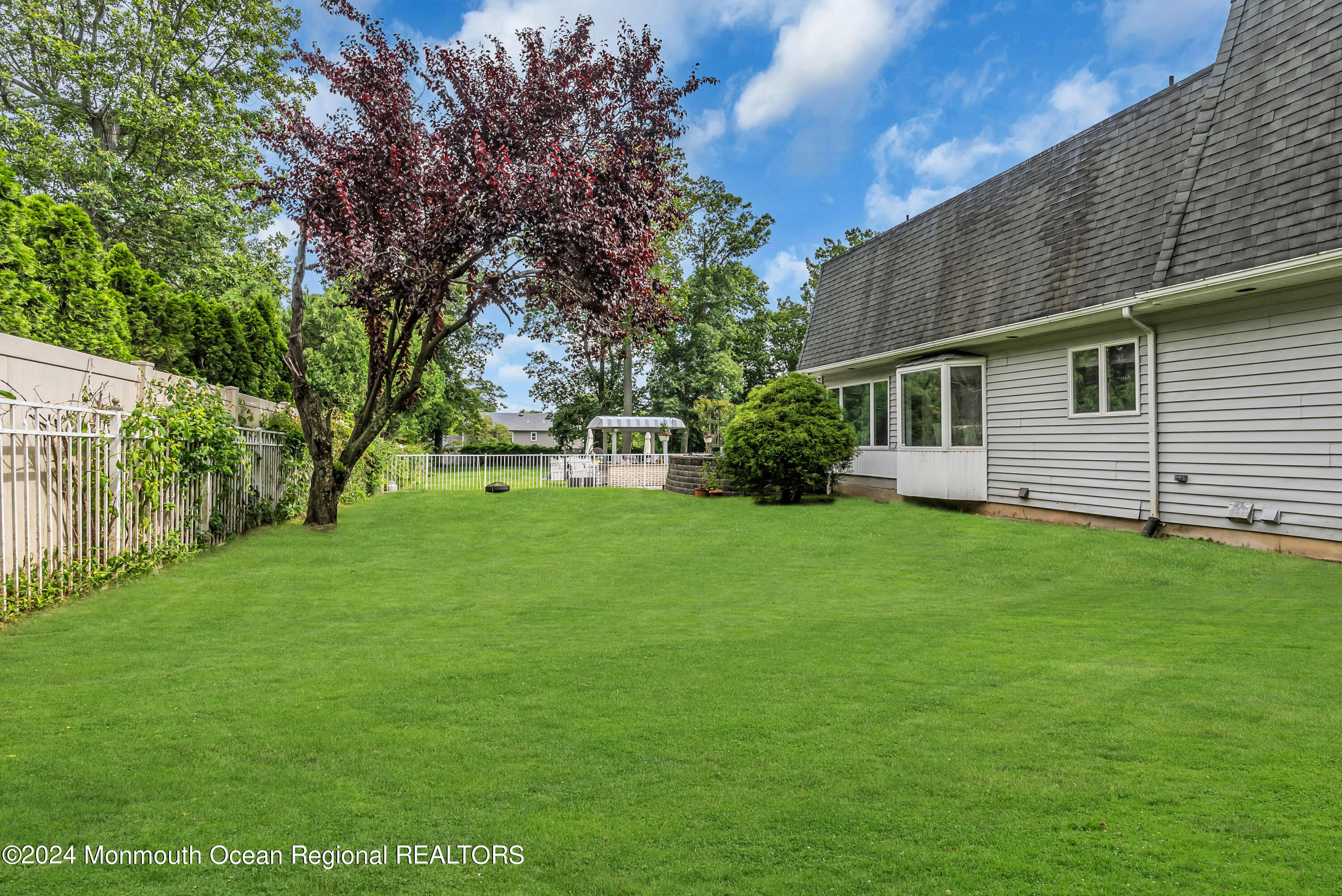 7 Decamp Court West Long Branch, NJ 07764 - Photo 31 of 32 a front view of a house with garden