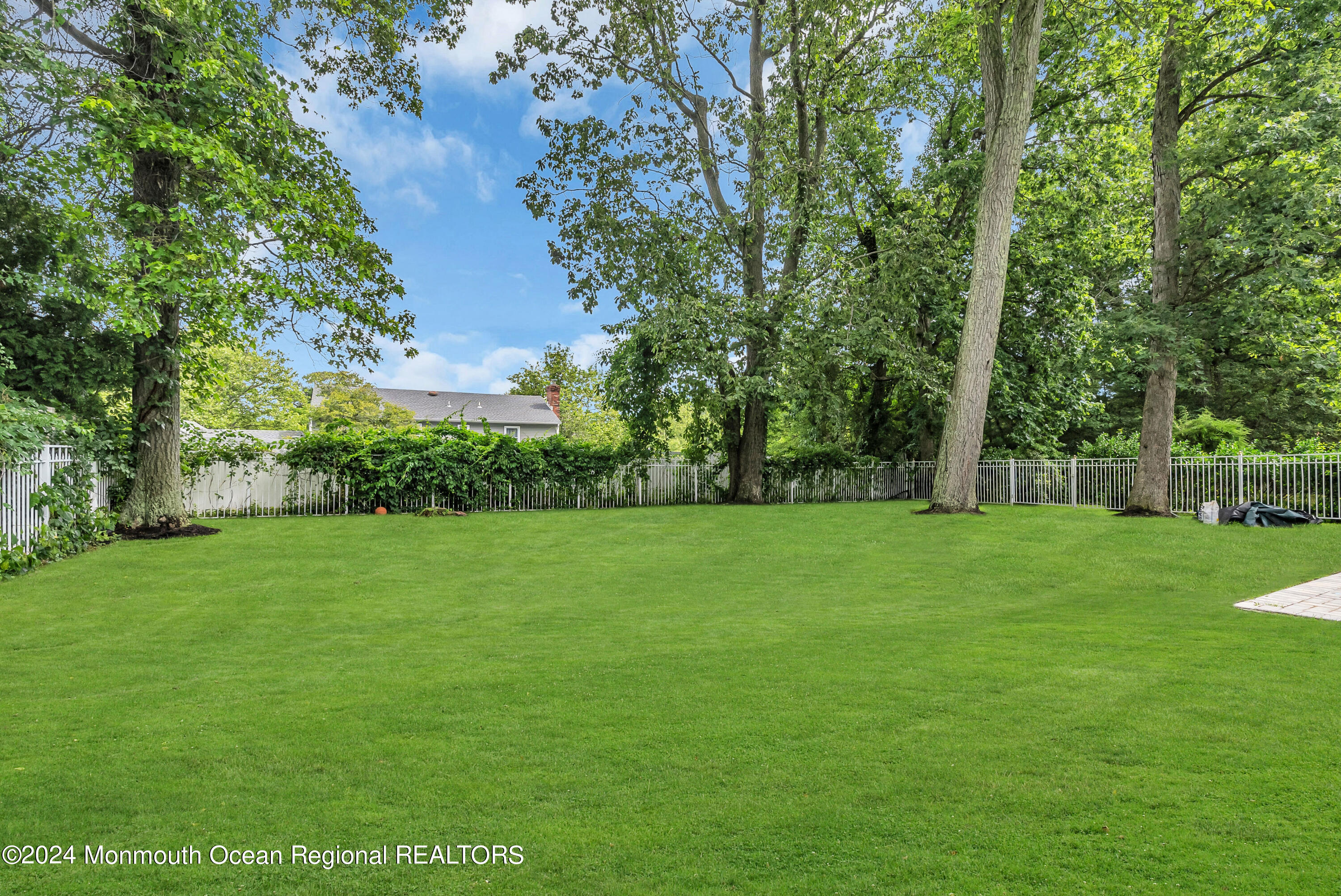 7 Decamp Court West Long Branch, NJ 07764 - Photo 32 of 32 a view of field with trees in the background