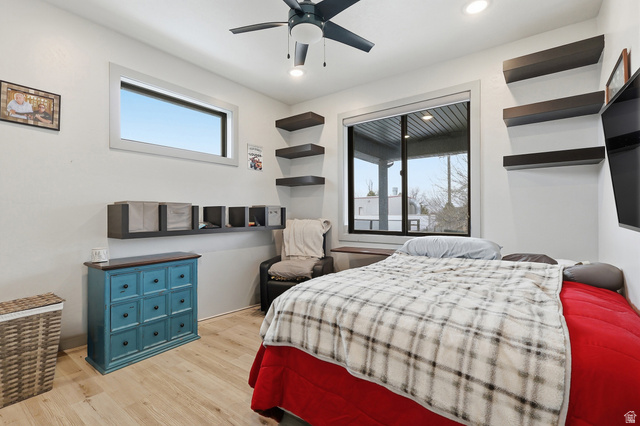 175 North 100 West Providence, UT 84332 - Photo 19 of 45 Bedroom with light wood-style floors and a ceiling fan