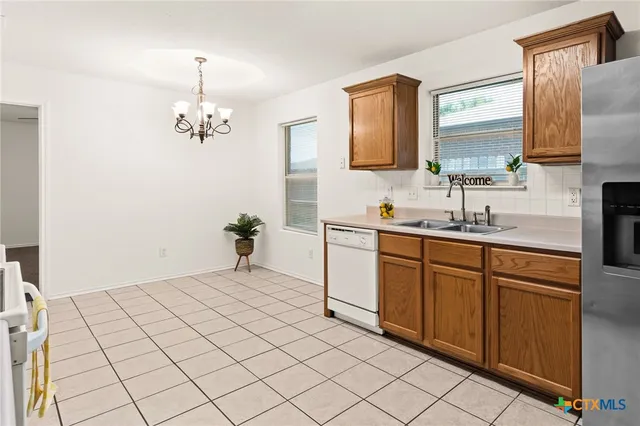 a spacious bathroom with a sink double vanity and a mirror