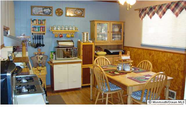 26 Annapolis Road Toms River, NJ 08757 - Photo 2 of 3 a room filled with furniture and a window