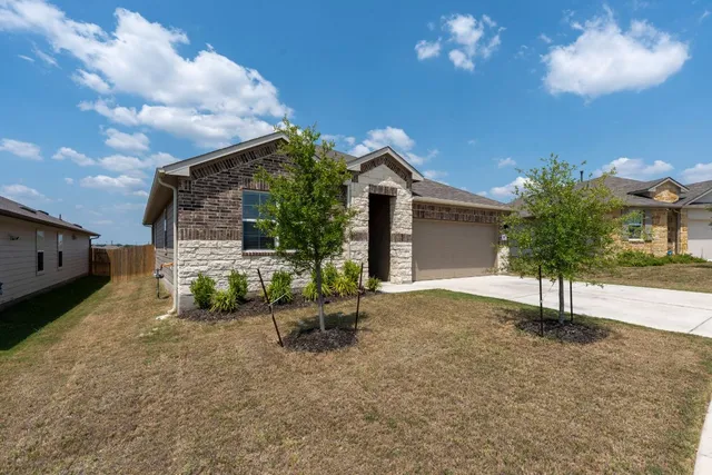 a view of backyard of house