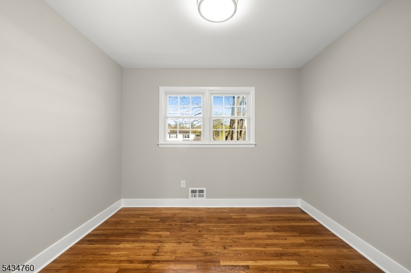 641 Ydv-ham Sq Road Robbinsville, NJ 08691 - Photo 20 of 49 a view of a room with wooden floor and window