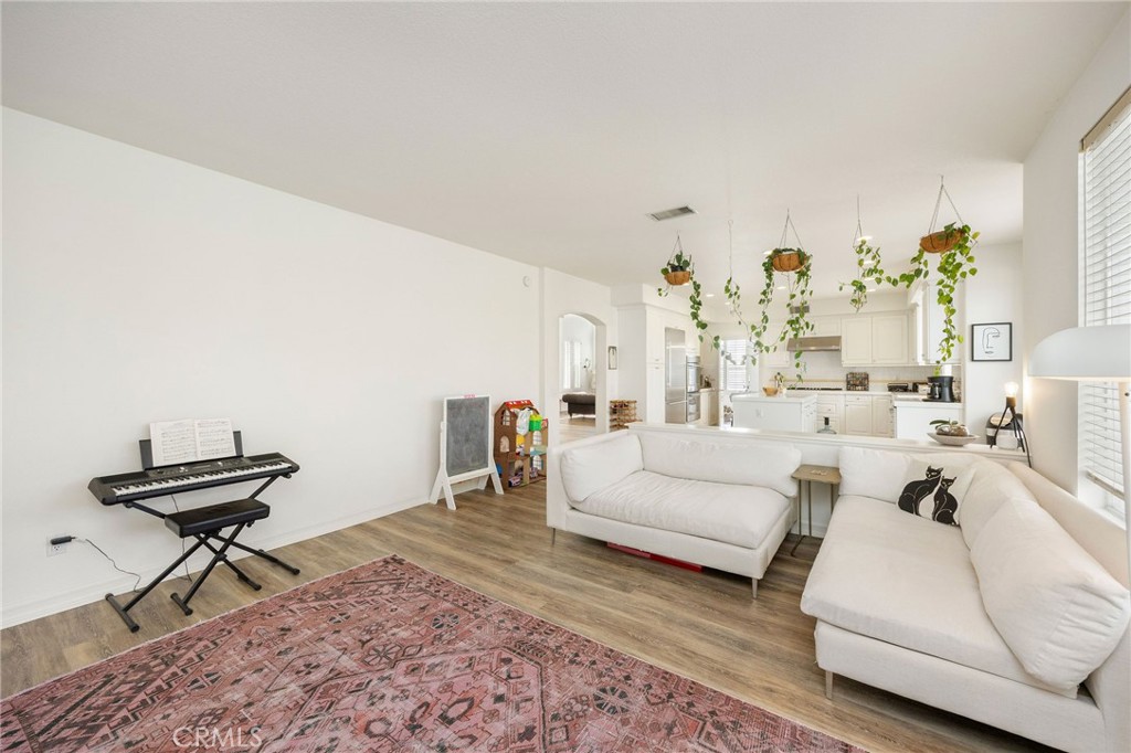 7211 Rock Ridge Terrace West Hills, CA 91307 - Photo 13 of 38 a living room with furniture and a rug