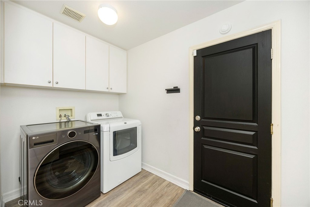 7211 Rock Ridge Terrace West Hills, CA 91307 - Photo 14 of 38 a utility room with dryer and washer