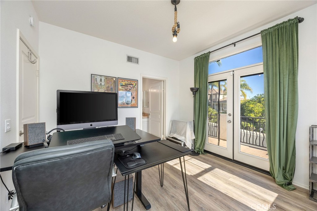 7211 Rock Ridge Terrace West Hills, CA 91307 - Photo 30 of 38 a living room with furniture and a flat screen tv