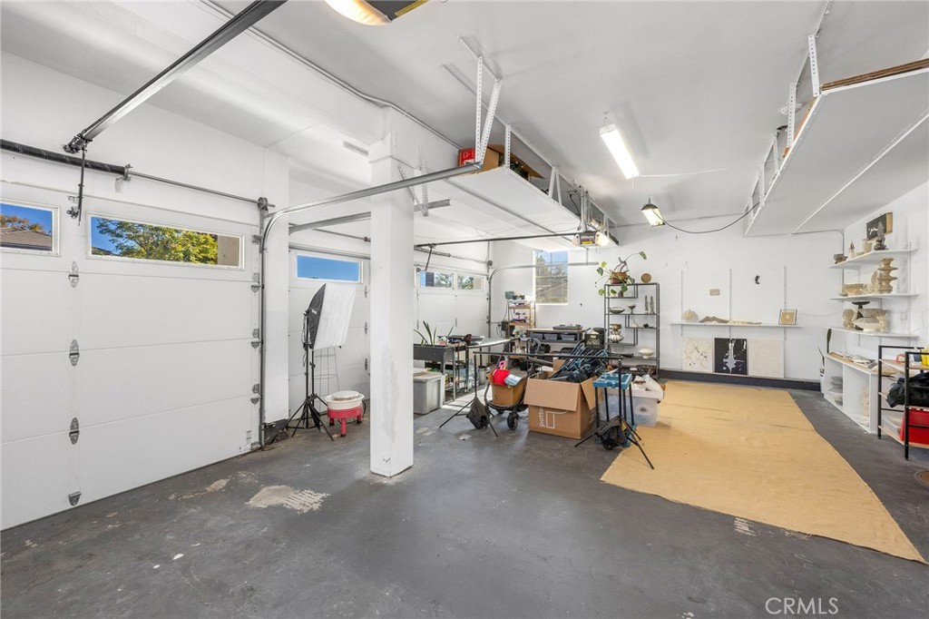 7211 Rock Ridge Terrace West Hills, CA 91307 - Photo 33 of 38 a view of a garage with a white couch
