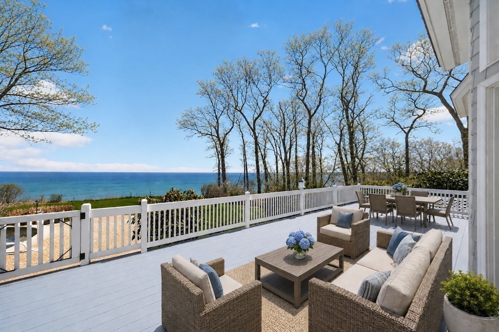 19 Ellisville Road Plymouth, MA 02360 - Photo 8 of 11 a balcony with table and chairs