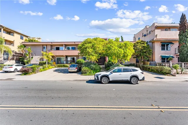 a cars parked in front of a building