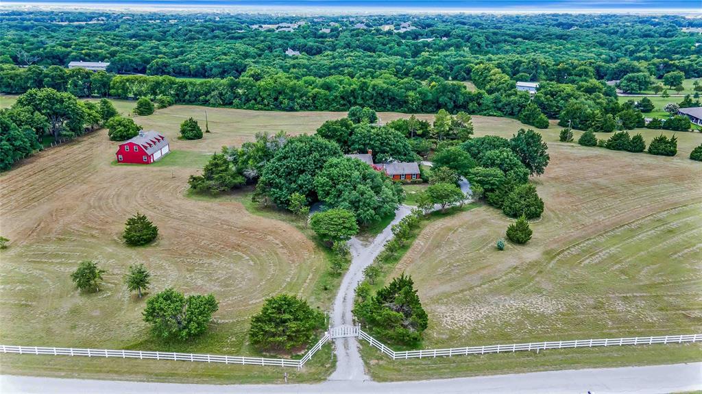 216 McMillen Road Lucas, TX 75002 - Photo 1 of 36 an aerial view of a house with yard