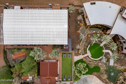 a view of a backyard with sitting area