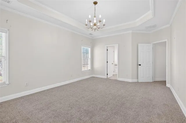 a spacious bathroom with a double vanity sink and a mirror
