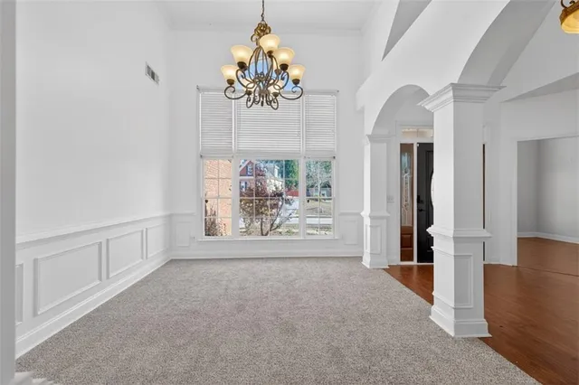 a view of a room with a large window