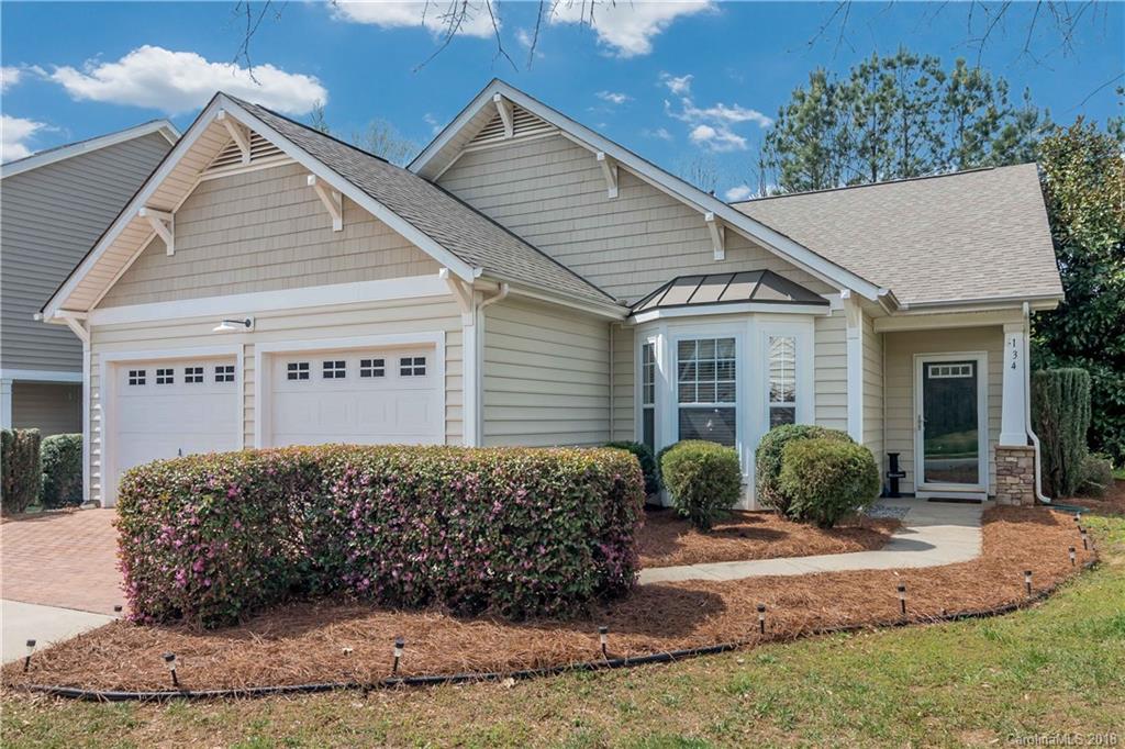 134 Whitley Mills Road, Unit 78 Fort Mill, SC 29708 - Photo 1 of 25 a front view of a house with garden