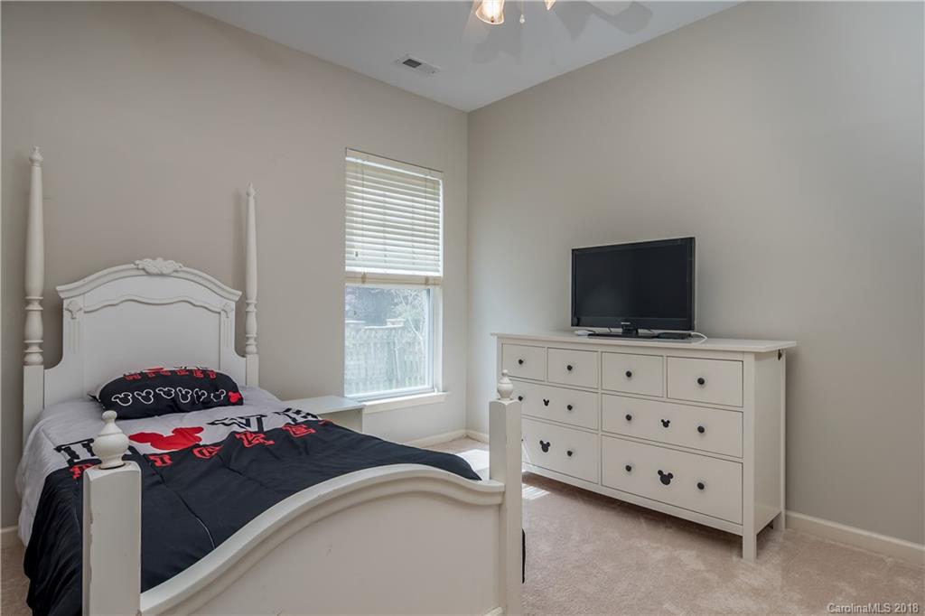 134 Whitley Mills Road, Unit 78 Fort Mill, SC 29708 - Photo 18 of 25 a living room with furniture and a flat screen tv