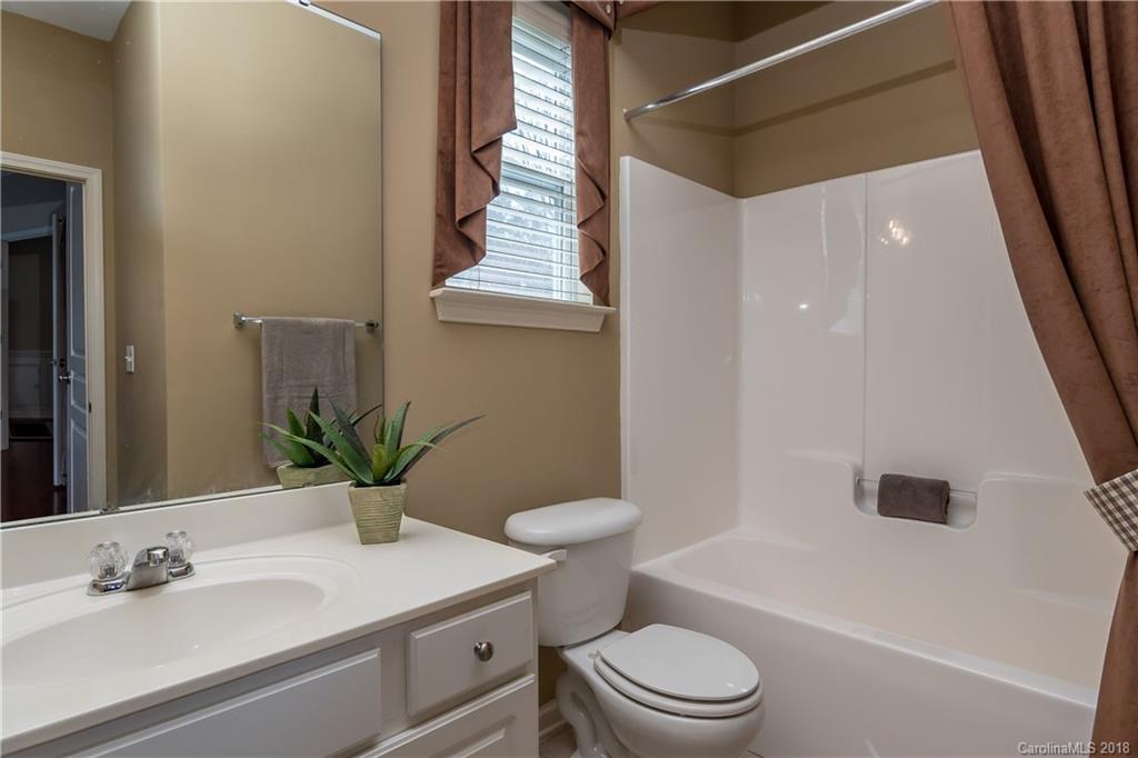 134 Whitley Mills Road, Unit 78 Fort Mill, SC 29708 - Photo 19 of 25 a bathroom with a sink toilet and shower