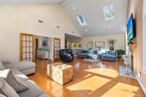 a living room with furniture or couch and a flat screen tv