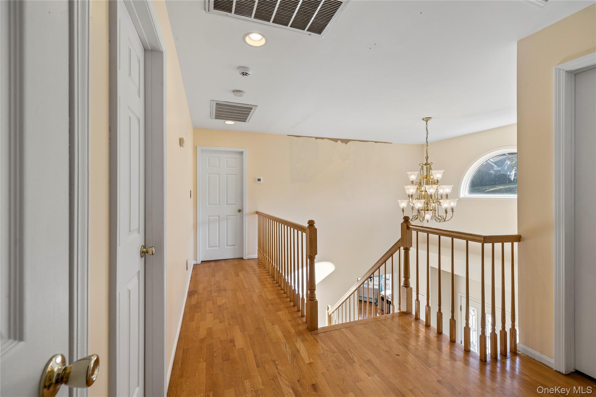 35 Pierce Road Stony Point, NY 10980 - Photo 20 of 45 Hall featuring an upstairs landing, light wood finished floors, a chandelier, and recessed lighting