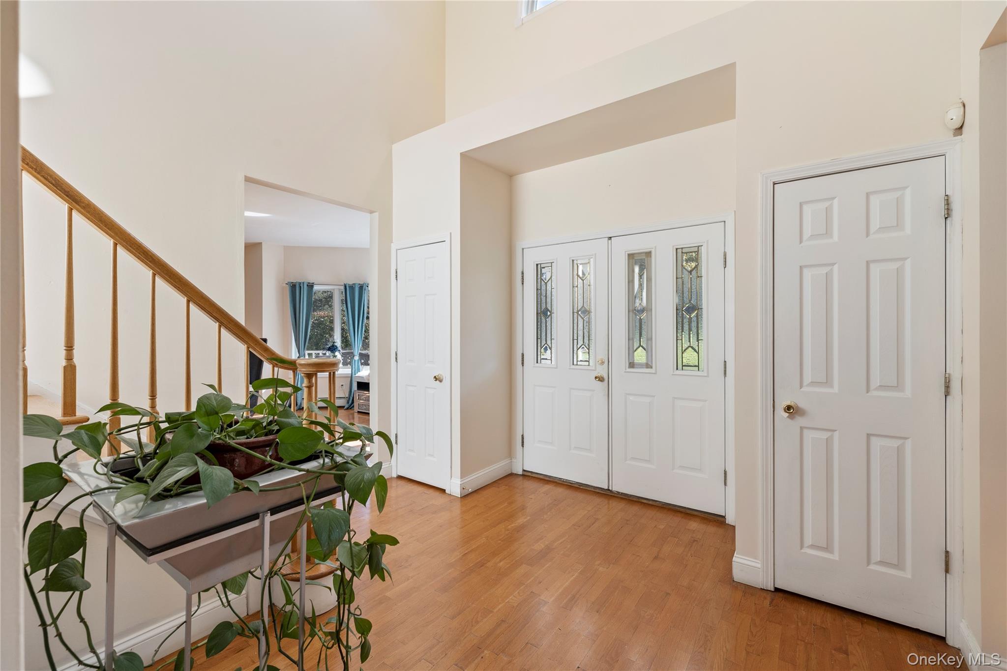 35 Pierce Road Stony Point, NY 10980 - Photo 8 of 45 Entrance foyer featuring light wood finished floors, a towering ceiling, and stairs