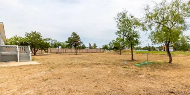 a house with trees in front of it