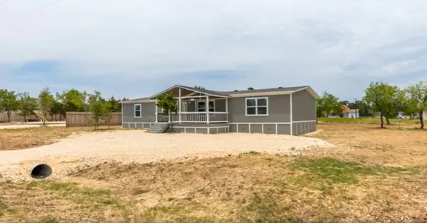 a view of house with outdoor space