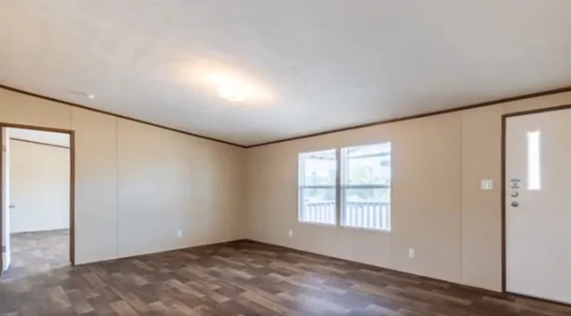 an empty room with windows