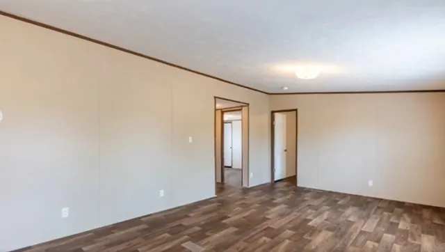 a kitchen with a refrigerator and a stove