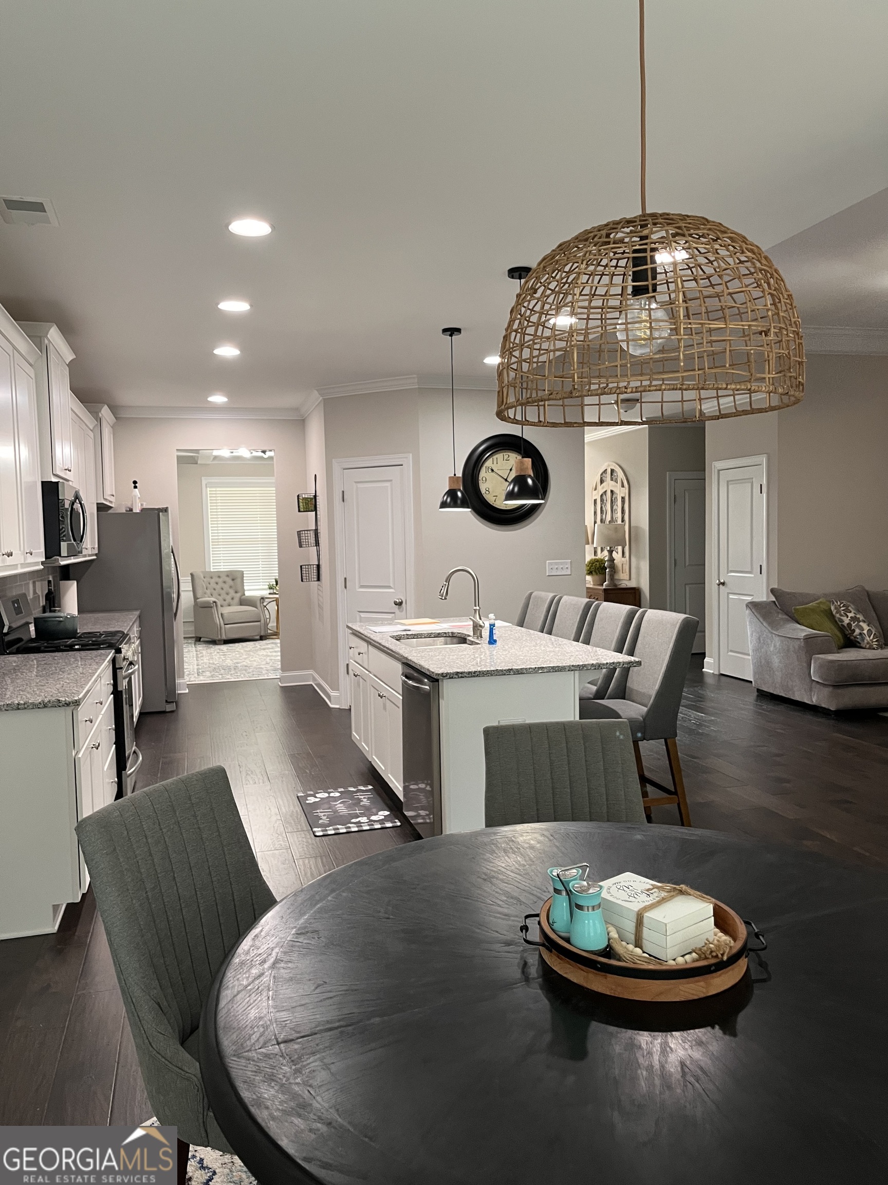 40 Owens Path Senoia, GA 30276 - Photo 18 of 21 a living room with furniture and a dining table