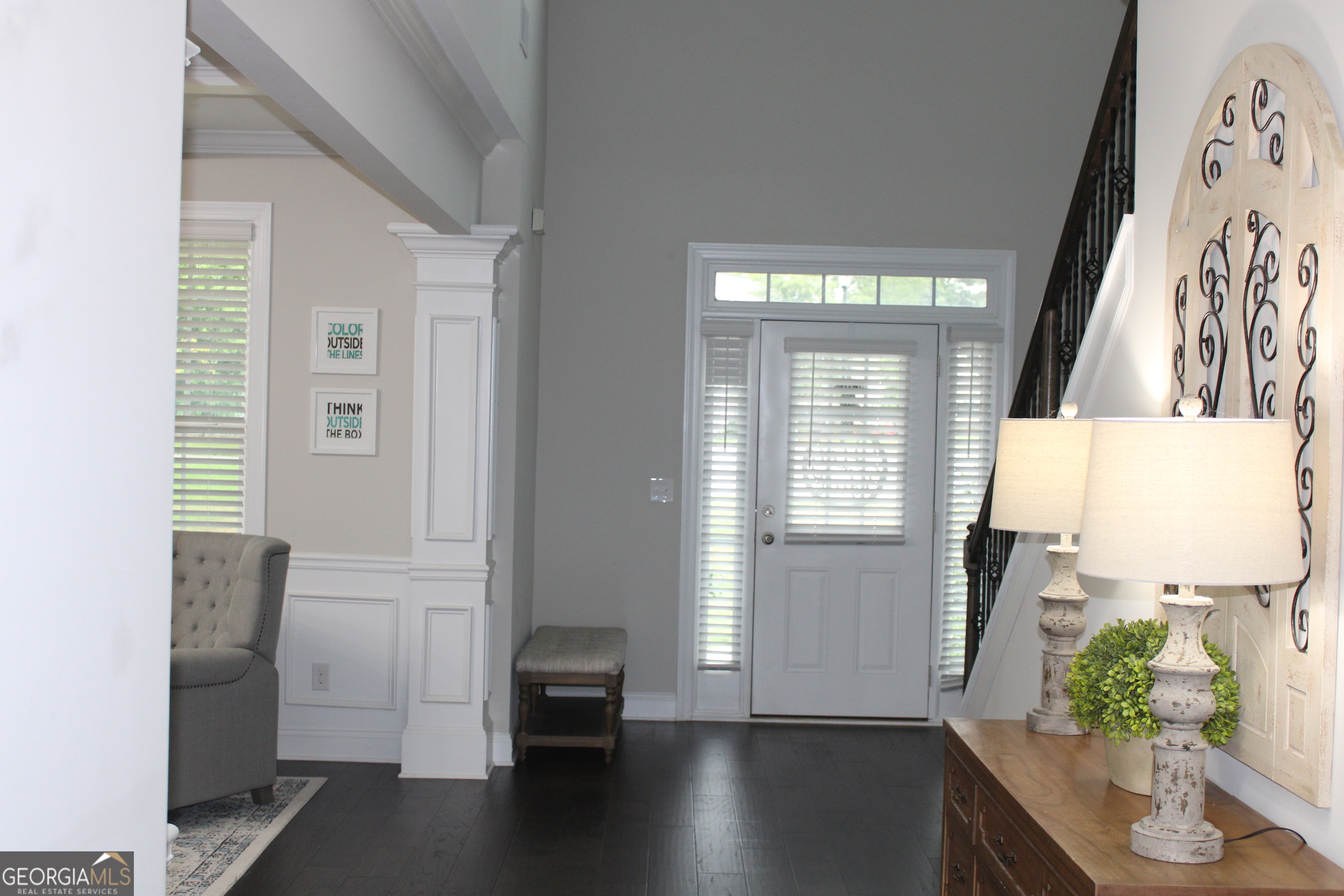 40 Owens Path Senoia, GA 30276 - Photo 3 of 21 a view of a hallway with wooden floor and a dining room