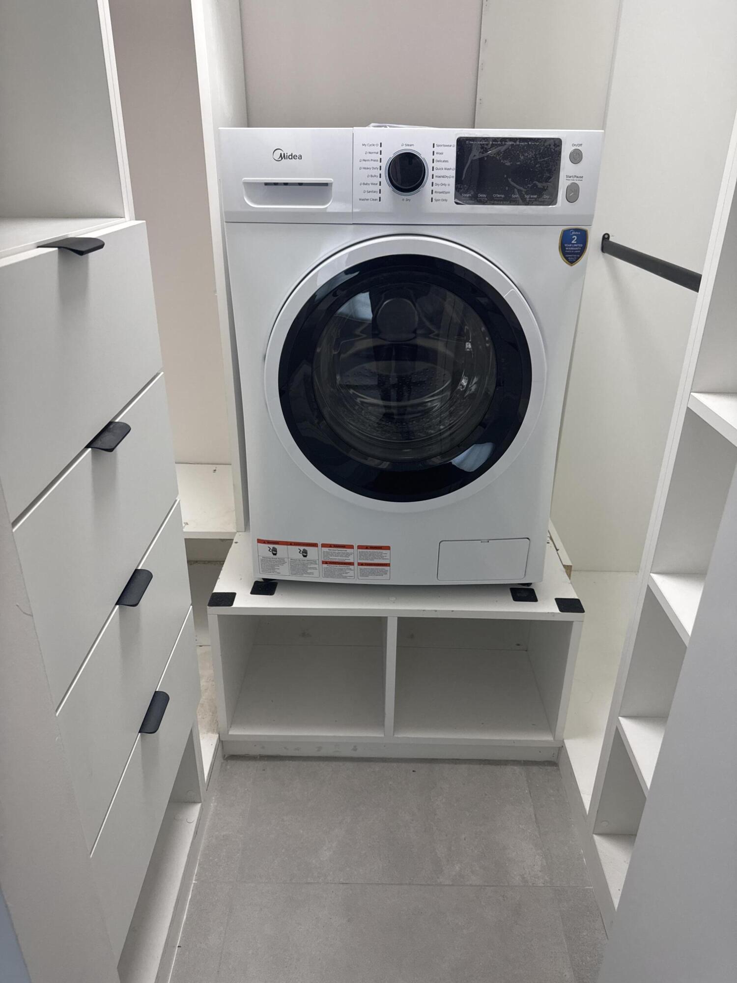 2871 North Ocean Boulevard, Unit R444 Boca Raton, FL 33431 - Photo 35 of 42 a utility room with dryer and washer