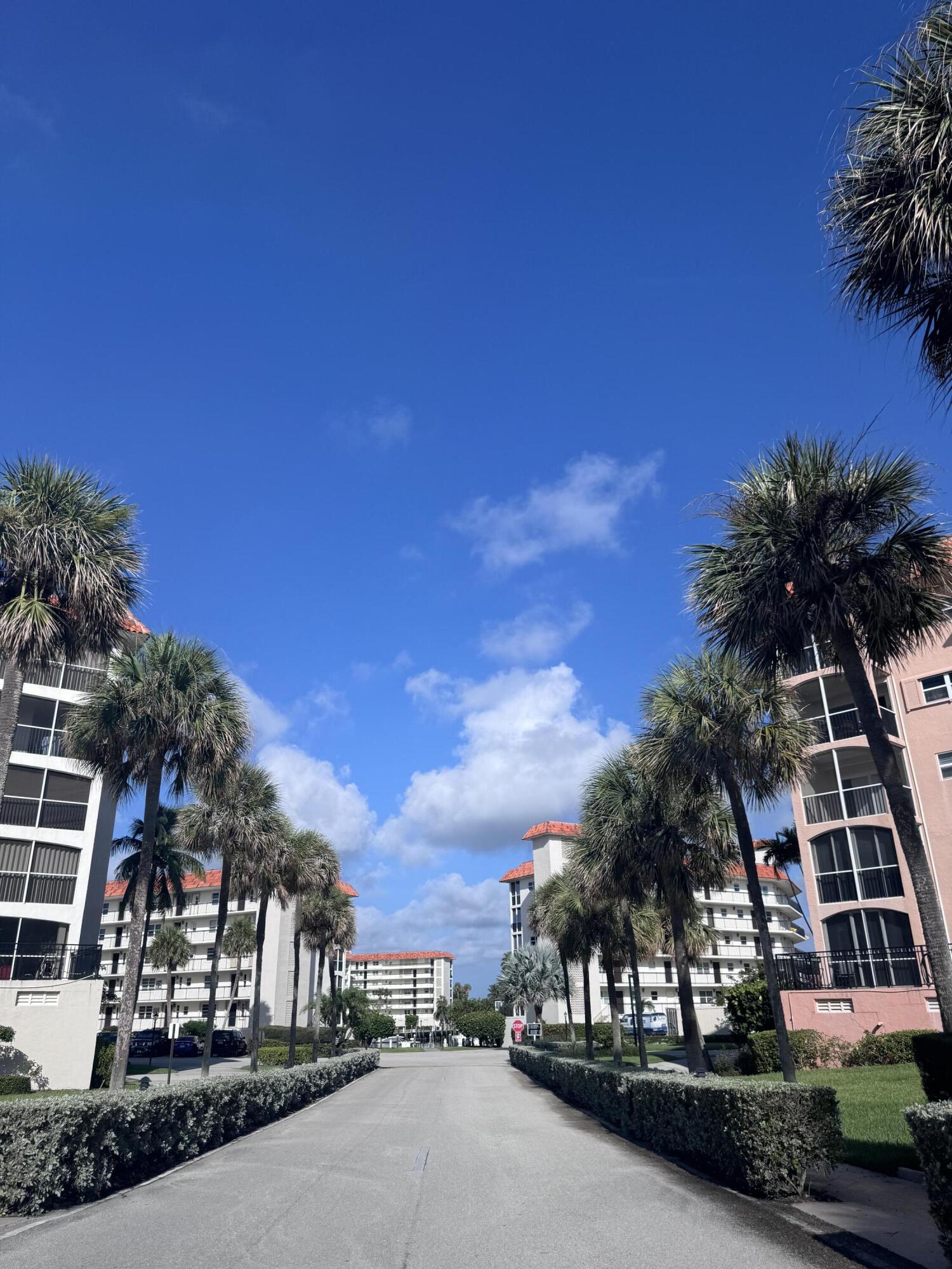 2871 North Ocean Boulevard, Unit R444 Boca Raton, FL 33431 - Photo 37 of 42 a front view of a house with a yard