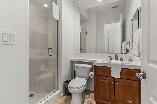 a view of a house with backyard sitting area and garden