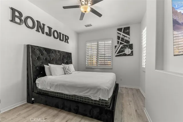 a bathroom with a shower sink and mirror