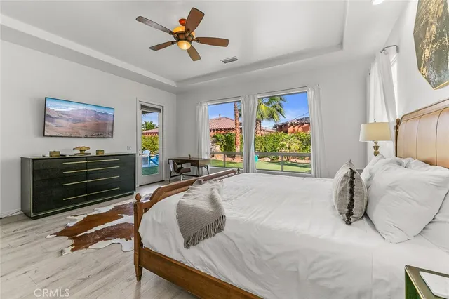 a view of a patio with couches chairs and a fire pit