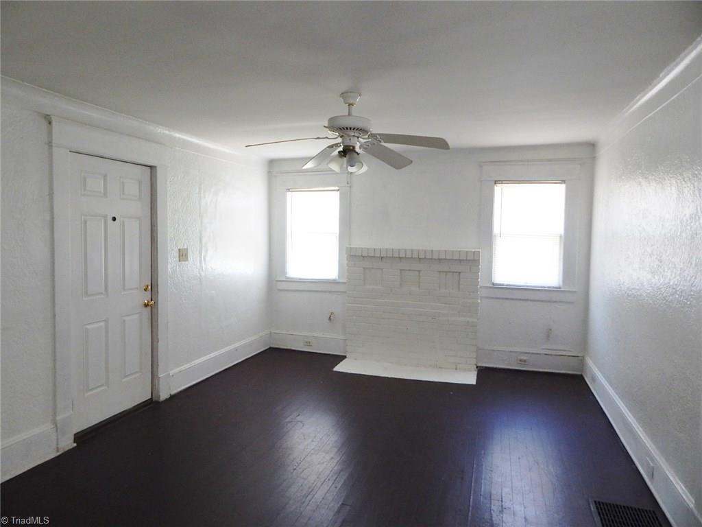 1304 Forrest Street High Point, NC 27262 - Photo 3 of 20 Large living room with hardwood floors.