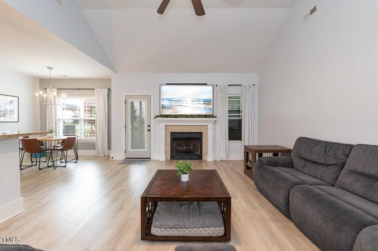 91 Colson Drive Garner, NC 27529 - Photo 11 of 46 a living room with furniture and a fireplace
