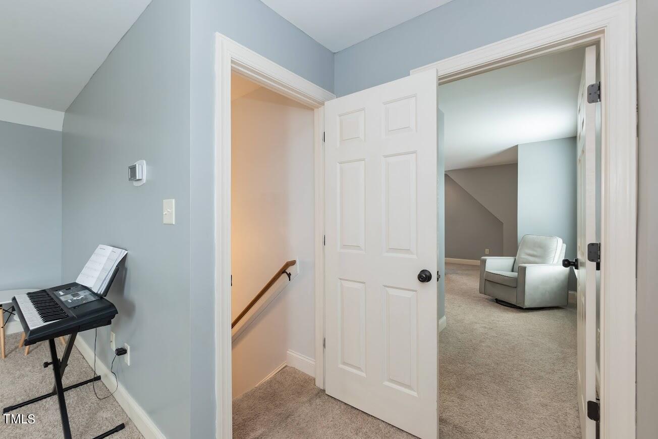 91 Colson Drive Garner, NC 27529 - Photo 32 of 46 a view of living room with furniture and wooden floor