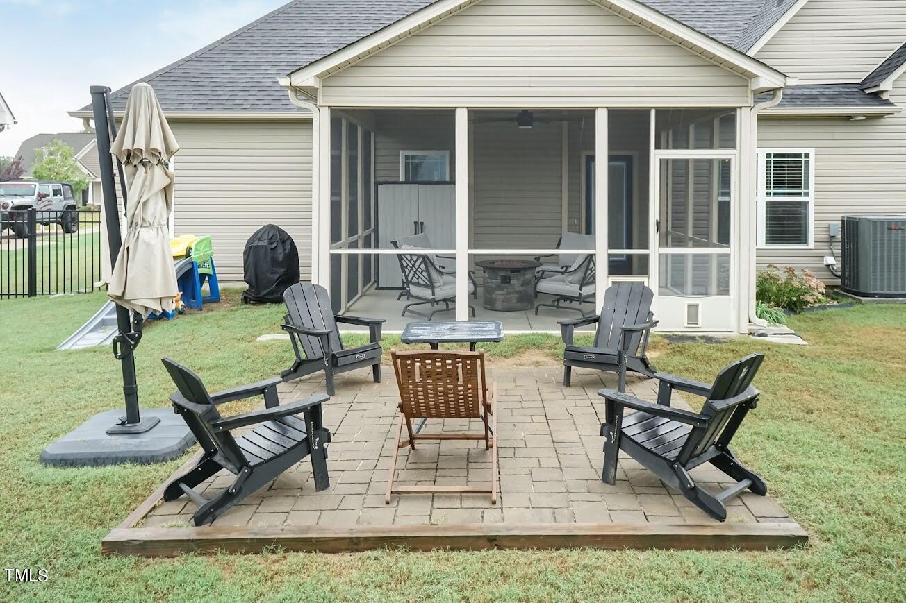91 Colson Drive Garner, NC 27529 - Photo 40 of 46 a building outdoor space with patio furniture