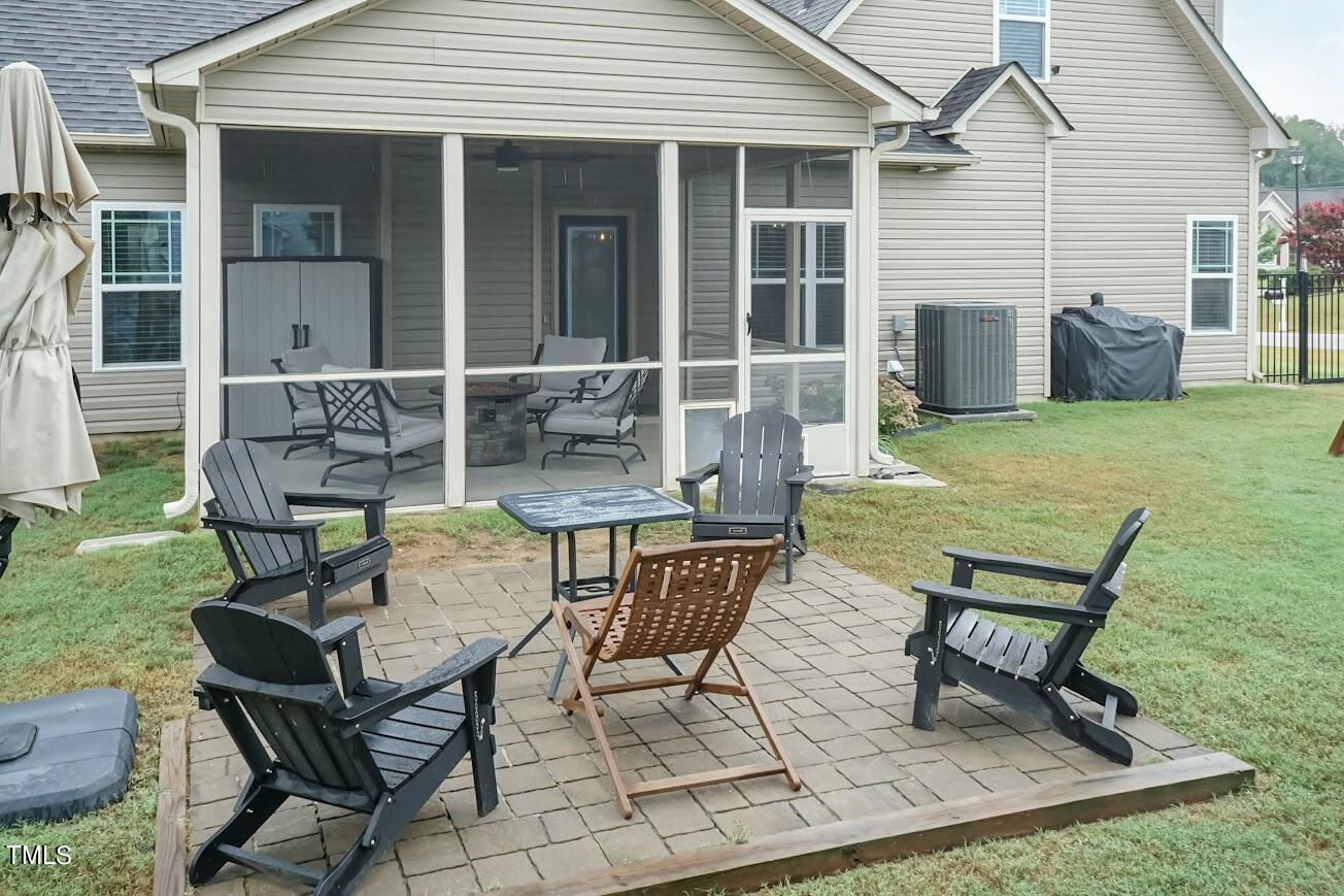 91 Colson Drive Garner, NC 27529 - Photo 41 of 46 a view of a house with backyard and sitting area