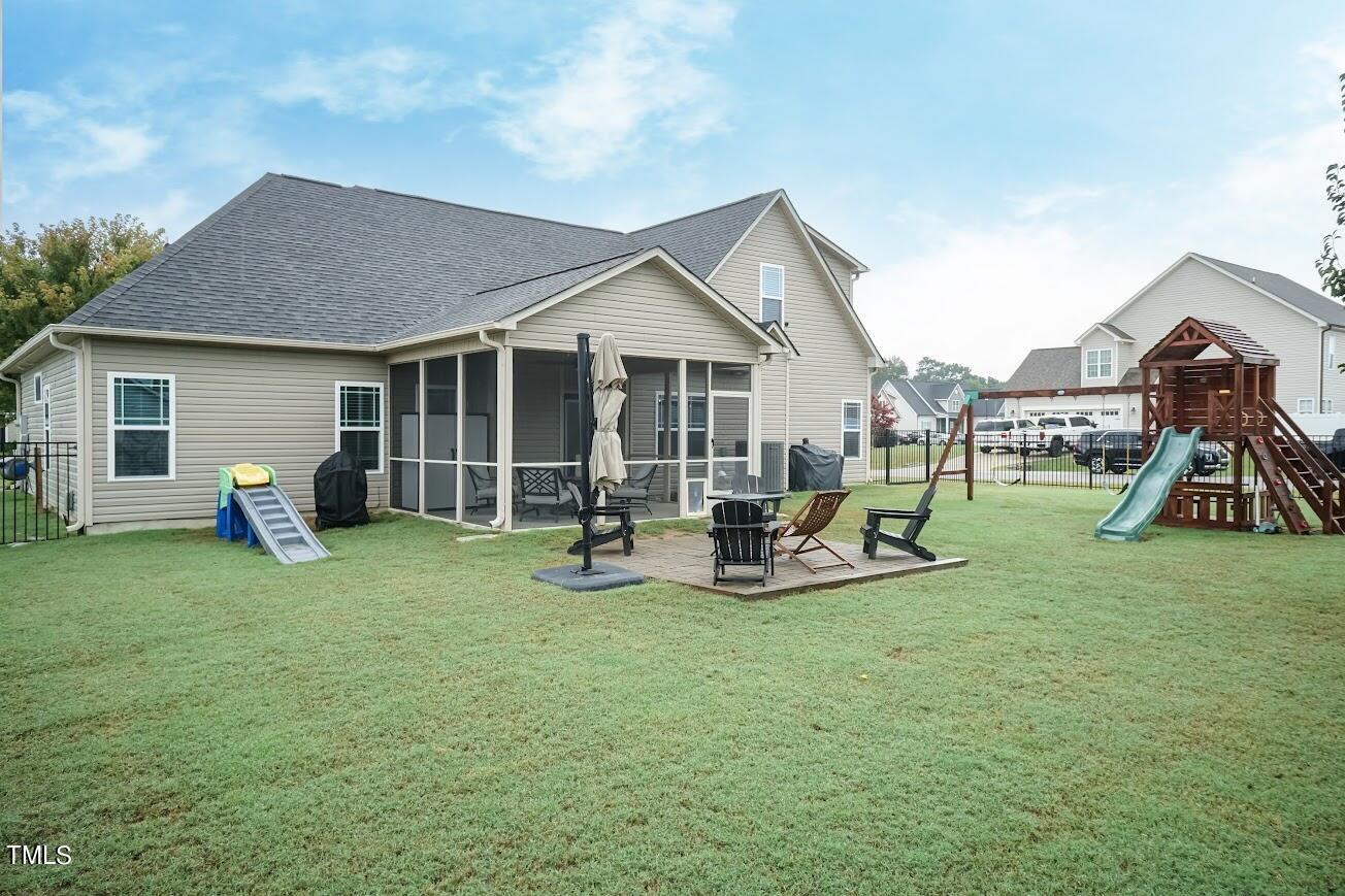 91 Colson Drive Garner, NC 27529 - Photo 45 of 46 a view of a house with backyard and porch