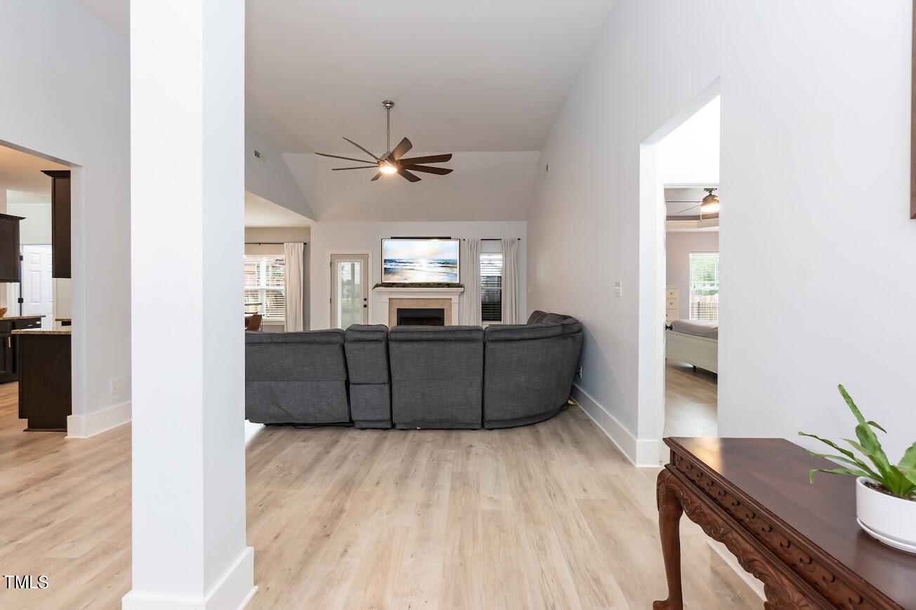 91 Colson Drive Garner, NC 27529 - Photo 8 of 46 a living room with furniture and a wooden floor