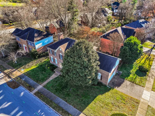 a backyard of a house with lots of green space