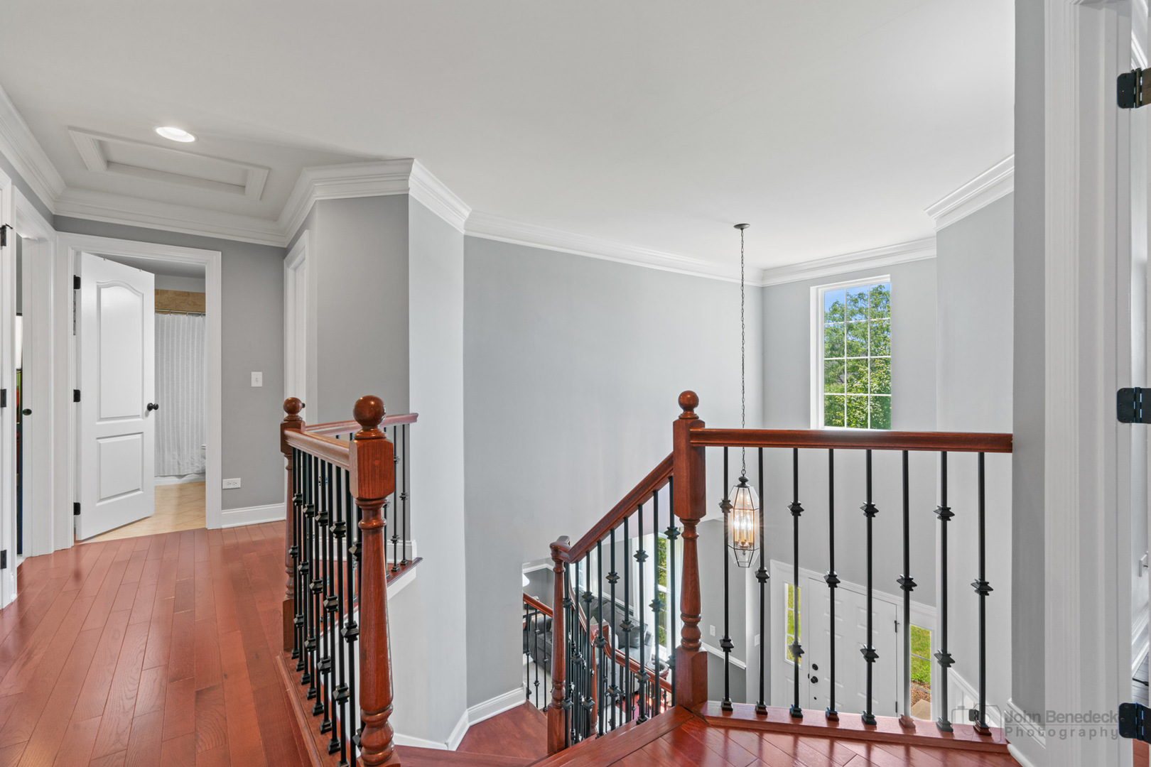 3666 Open Parkway Elgin, IL 60124 - Photo 21 of 40 a view of hallway with wooden floor and stairs