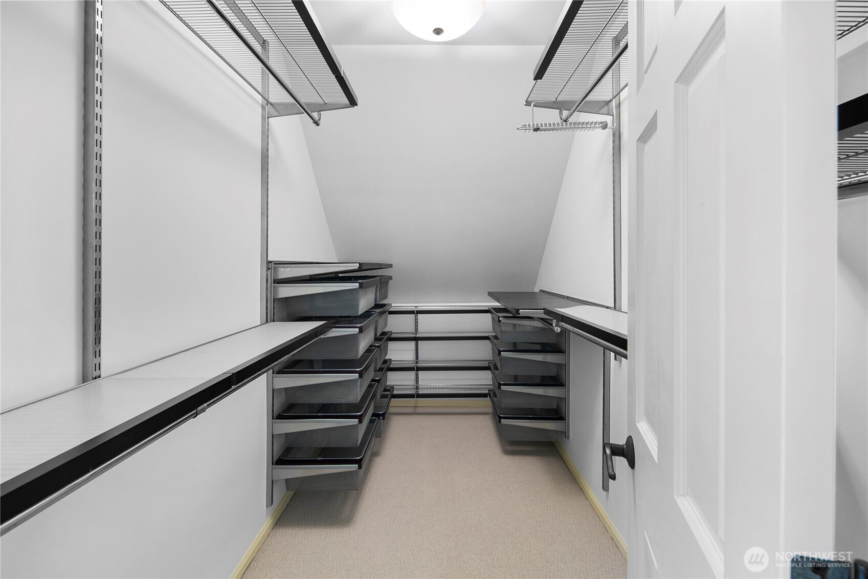 2020 Evergreen Point Road Medina, WA 98039 - Photo 23 of 38 a view of walk in closet with empty racks
