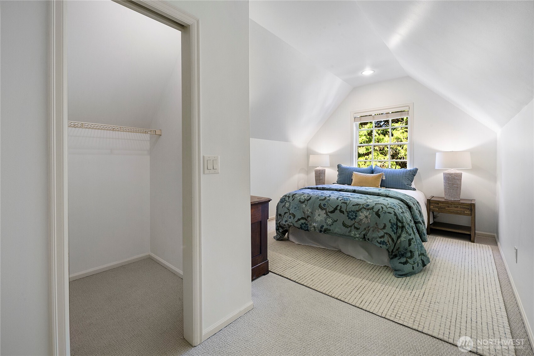 2020 Evergreen Point Road Medina, WA 98039 - Photo 27 of 38 a bedroom with a bed and a window