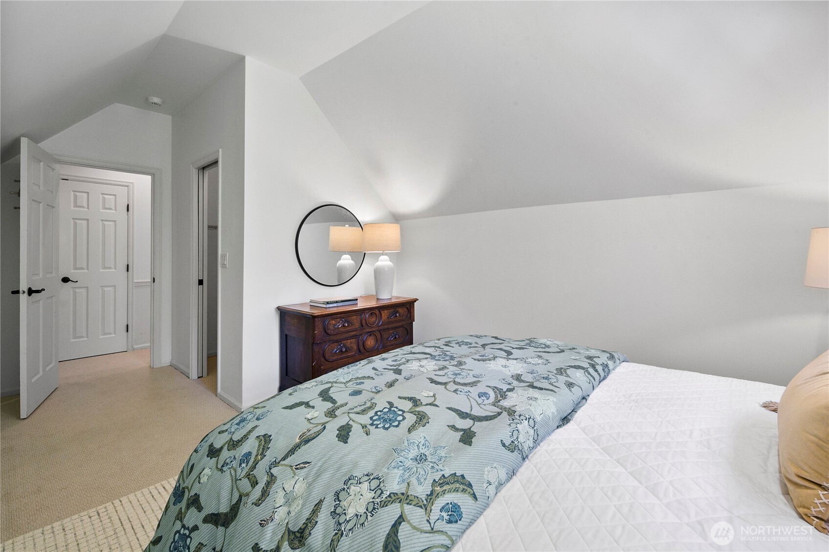 2020 Evergreen Point Road Medina, WA 98039 - Photo 28 of 38 a bedroom with a bed and a mirror