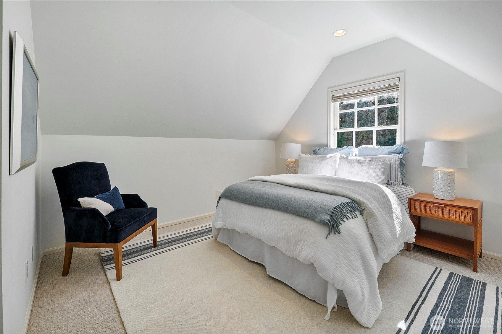 2020 Evergreen Point Road Medina, WA 98039 - Photo 29 of 38 a bedroom with a bed and a window