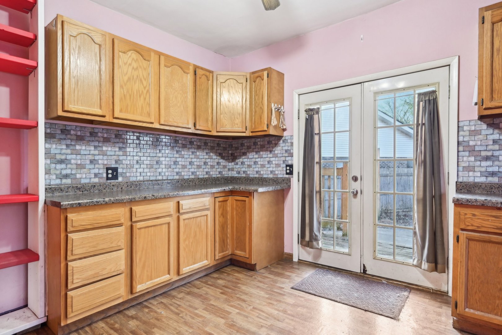 214 South Prospect Street Marengo, IL 60152 - Photo 11 of 37 a view of a kitchen with granite countertop cabinets