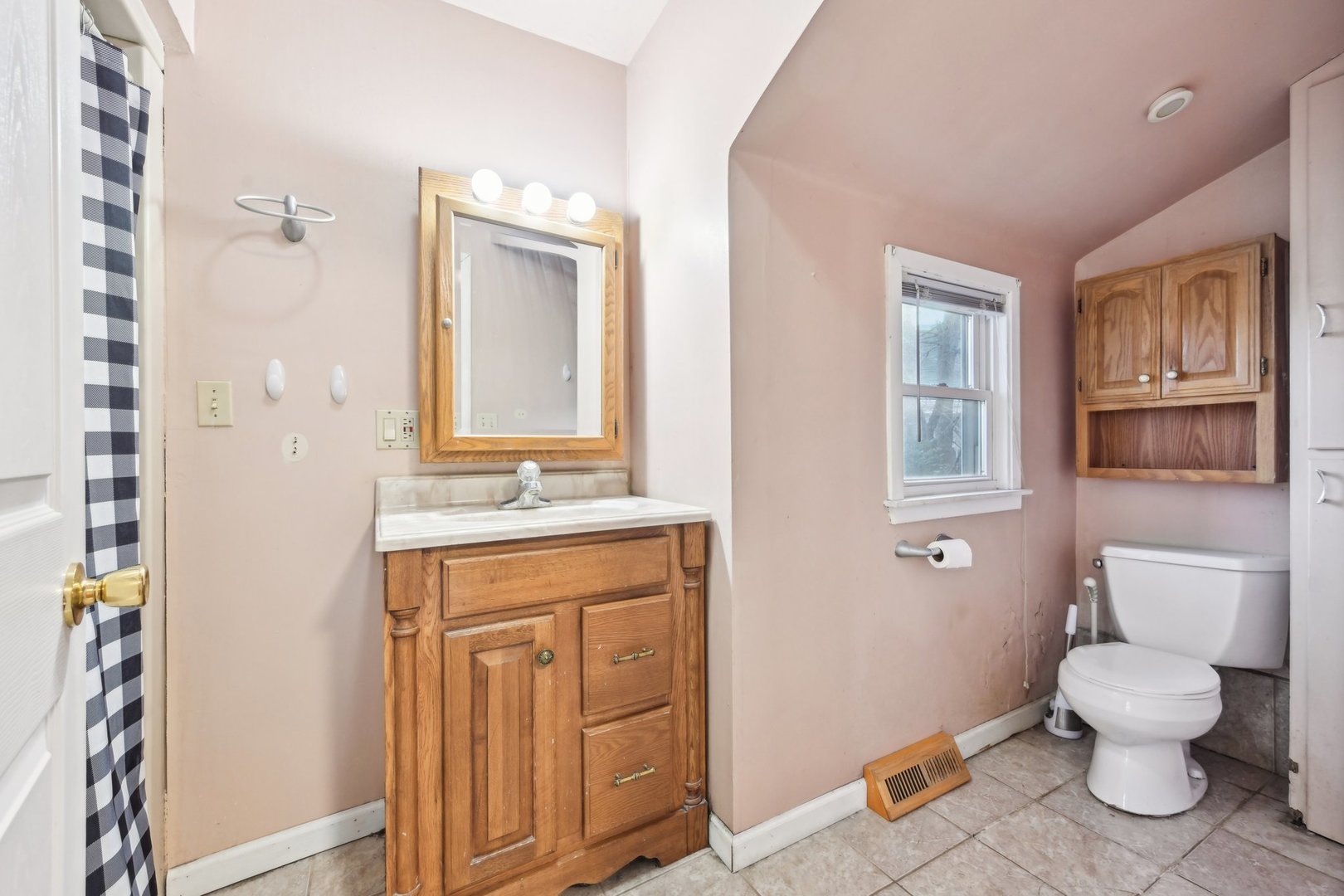 214 South Prospect Street Marengo, IL 60152 - Photo 23 of 37 a bathroom with a toilet a sink and a mirror